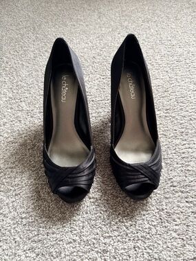 le chateau Black Satin Peep-Toe Twist Pumps